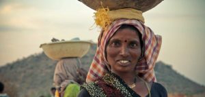 Woman carrying load on her head