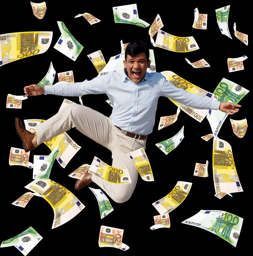 Man jumping with Money Rain in background