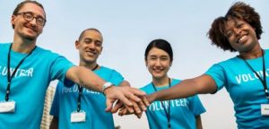 volunteers holding hands