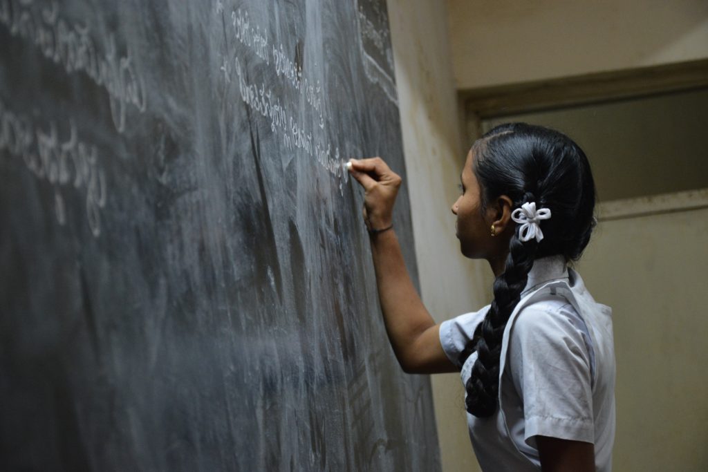 girl in classroom/school